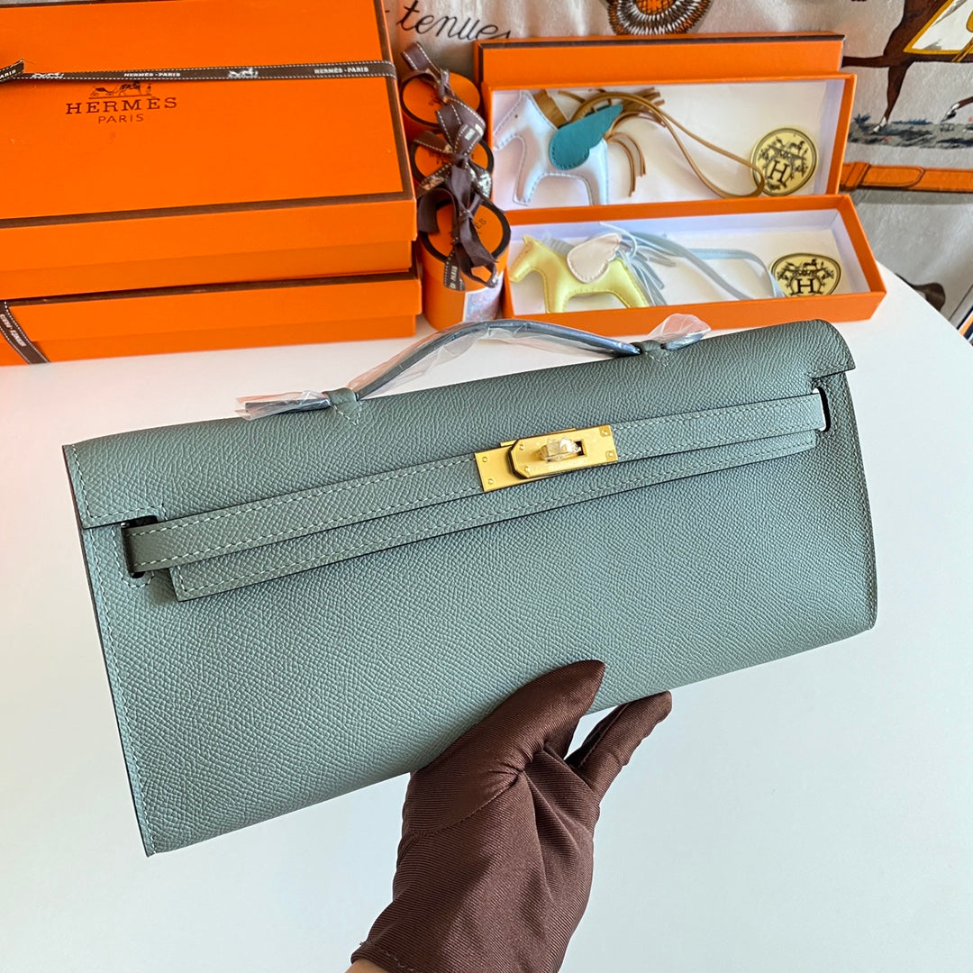 HERMES KELLY CUT 31 IN SEAFOAM GREEN CALFSKIN WITH GOLD HARDWARE