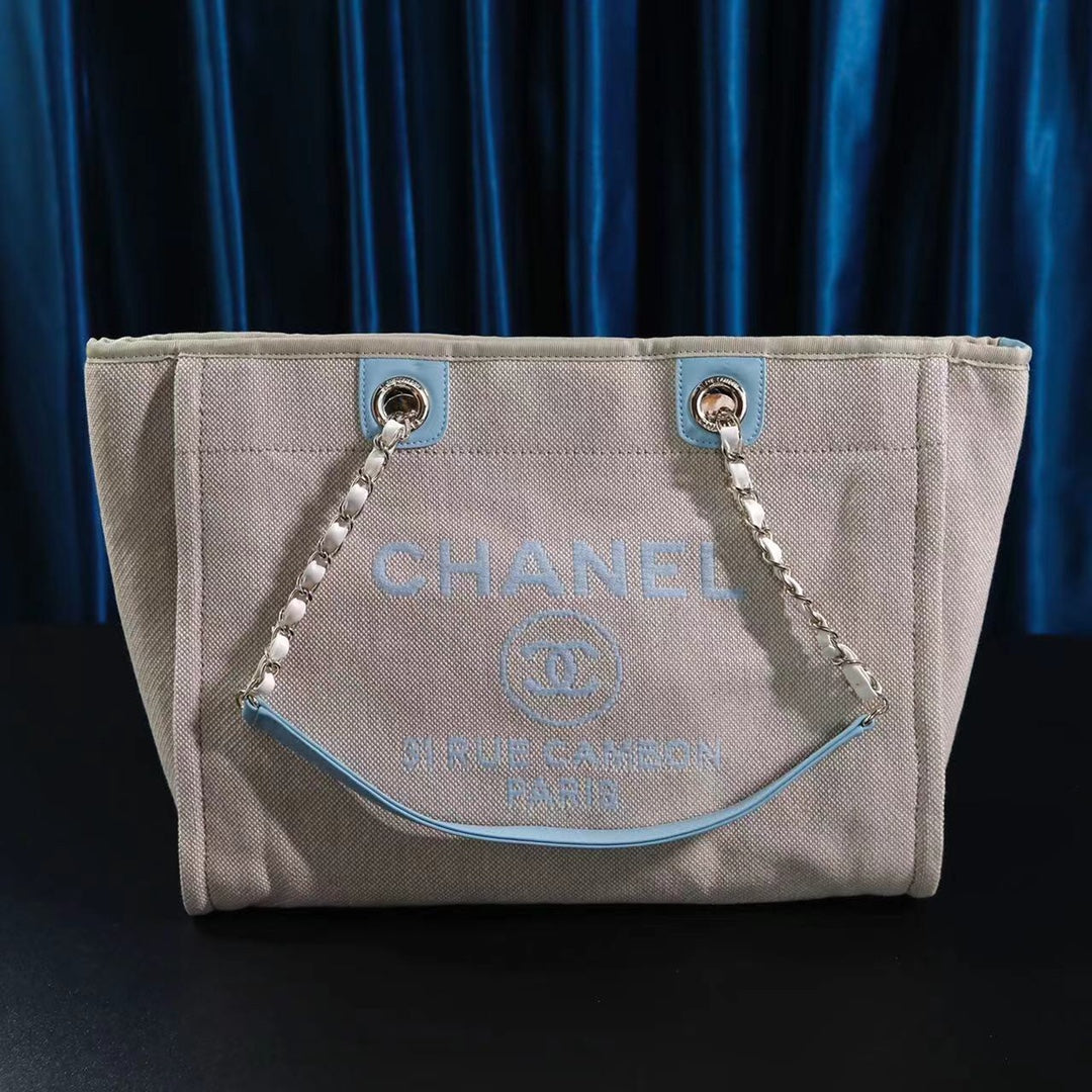 CHANEL DEAUVILLE LARGE 39 TOTE BAG IN BEIGE CANVAS WITH LIGHT BLUE CHAIN
