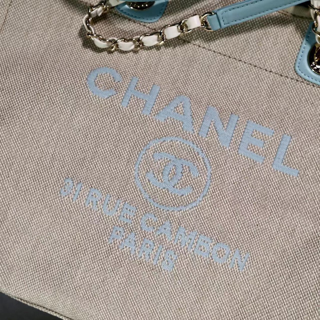 CHANEL DEAUVILLE LARGE 39 TOTE BAG IN BEIGE CANVAS WITH LIGHT BLUE CHAIN