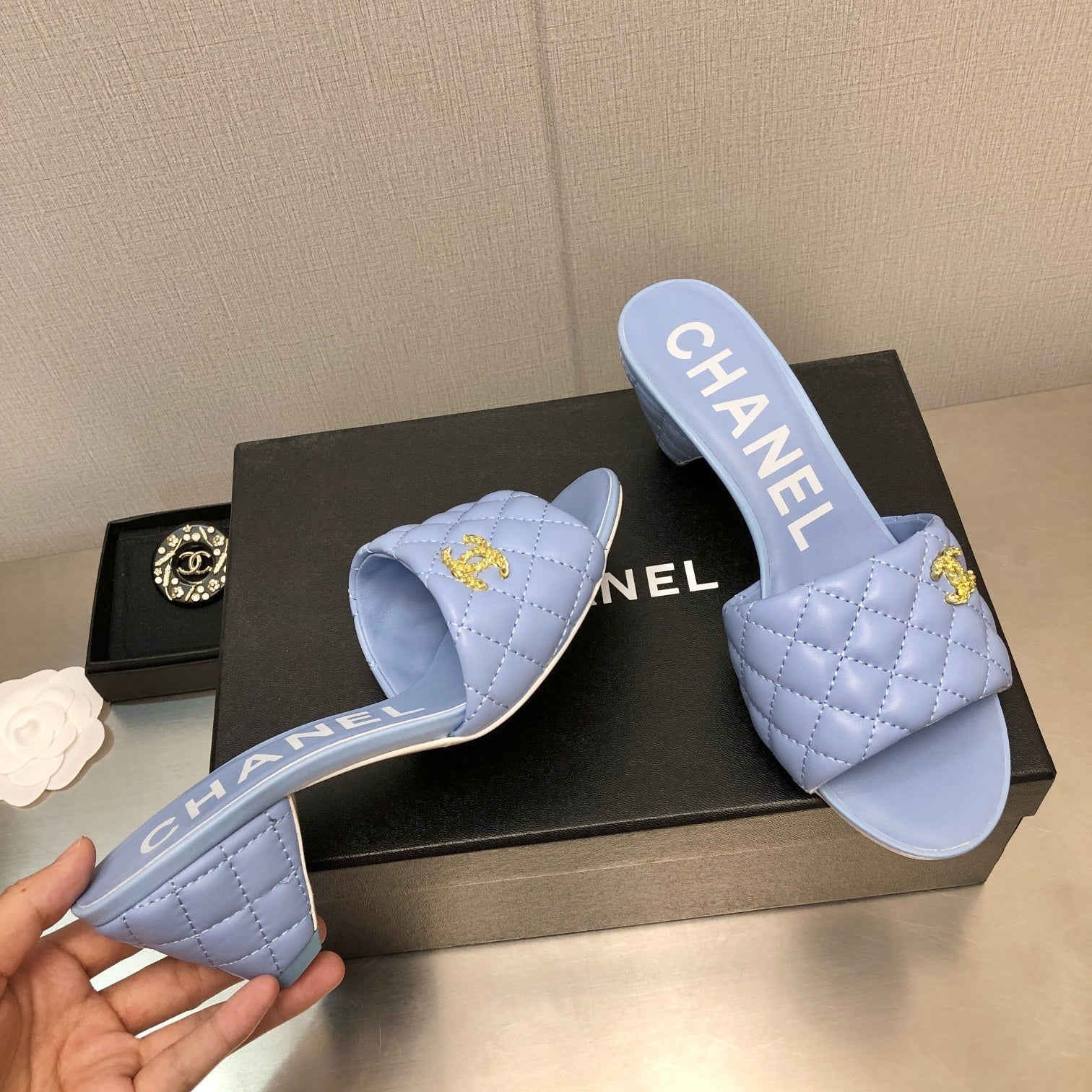 CHANEL DIAMOND-QUILTED 6 CM SANDALS IN CAROLINA BLUE LAMBSKIN