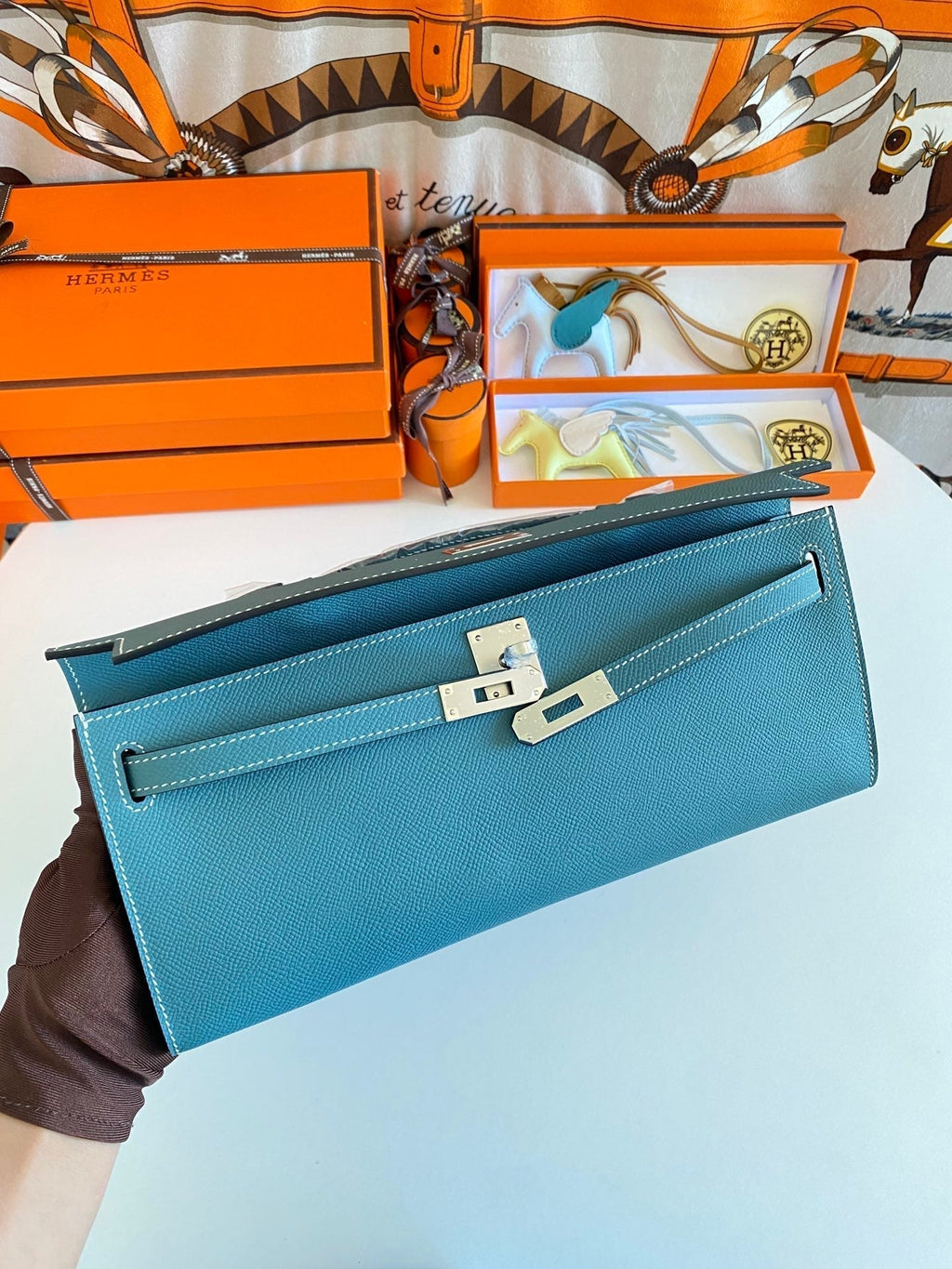 HERMES KELLY CUT 31 IN AZURE BLUE CALFSKIN WITH SILVER HARDWARE