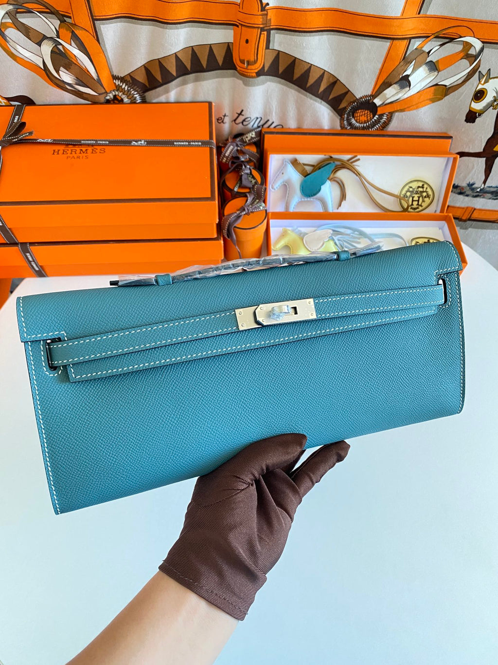 HERMES KELLY CUT 31 IN AZURE BLUE CALFSKIN WITH SILVER HARDWARE