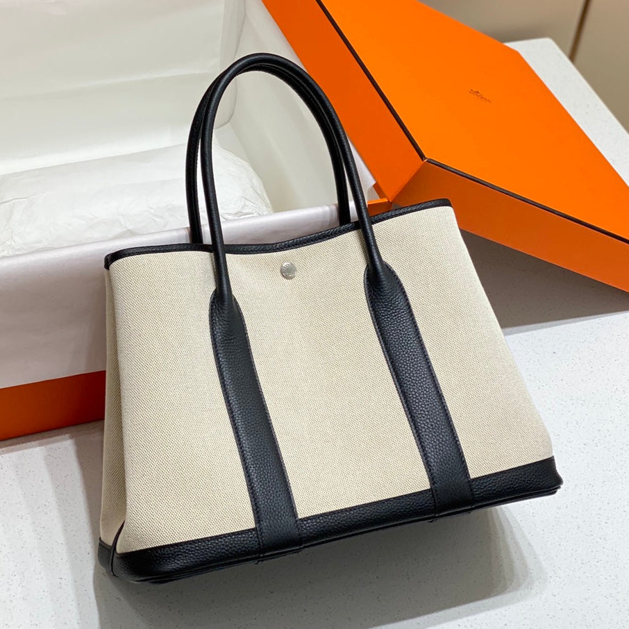 HERMES GARDEN PARTY 36CM IN WHITE TOILETS COTTON CANVAS AND BLACK CALFSKIN