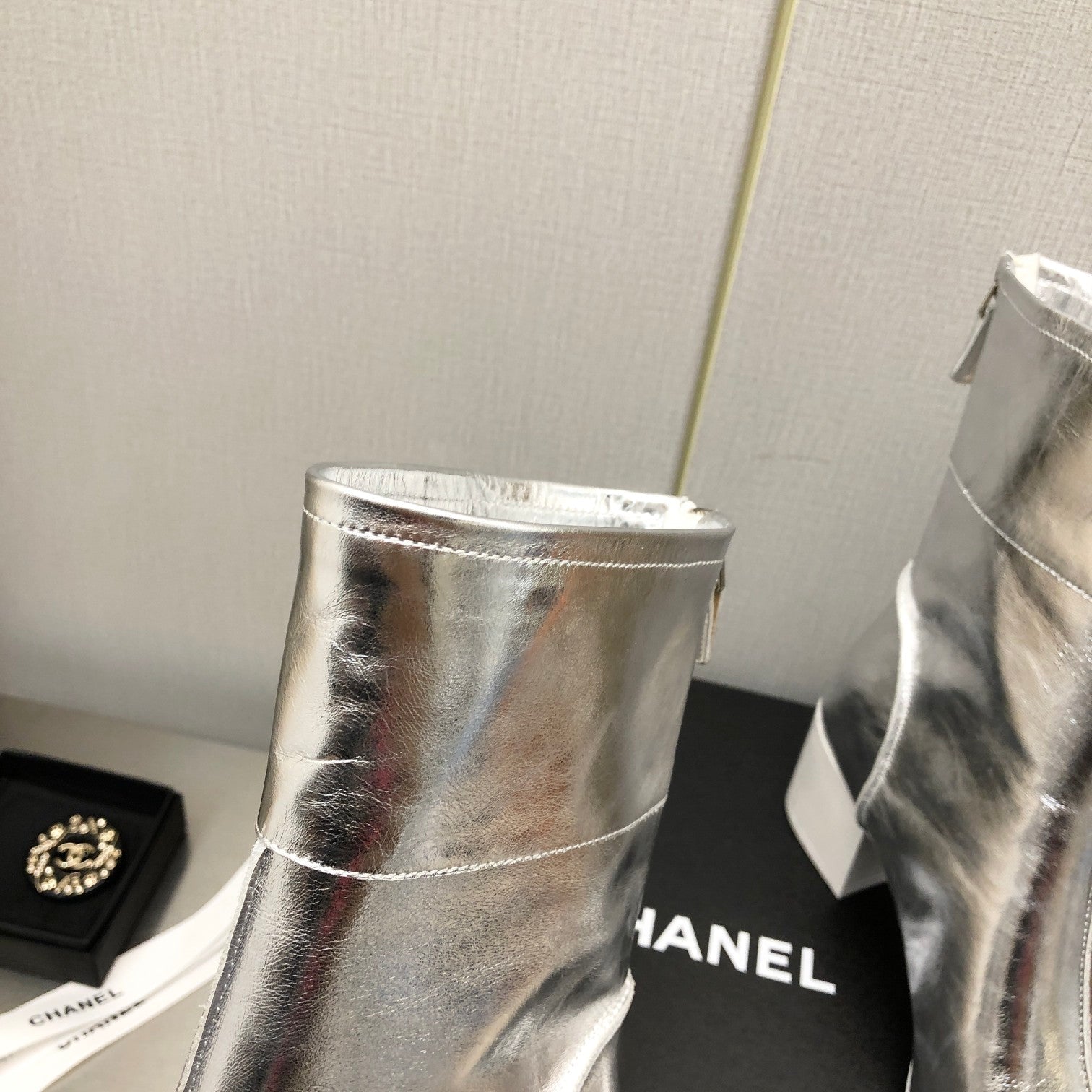 CHANEL BLOCK HEEL ANKLE BOOTS IN SILVER CALFSKIN