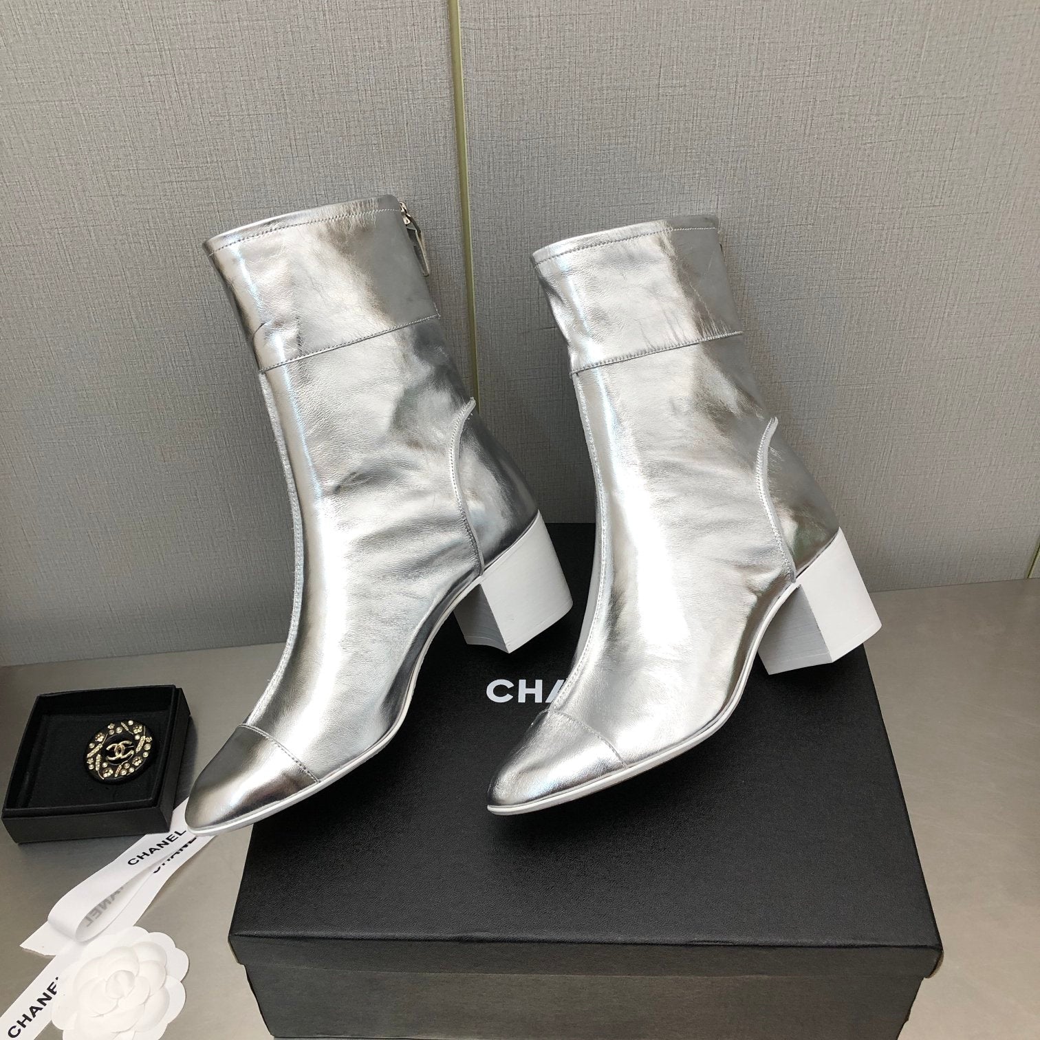 CHANEL BLOCK HEEL ANKLE BOOTS IN SILVER CALFSKIN
