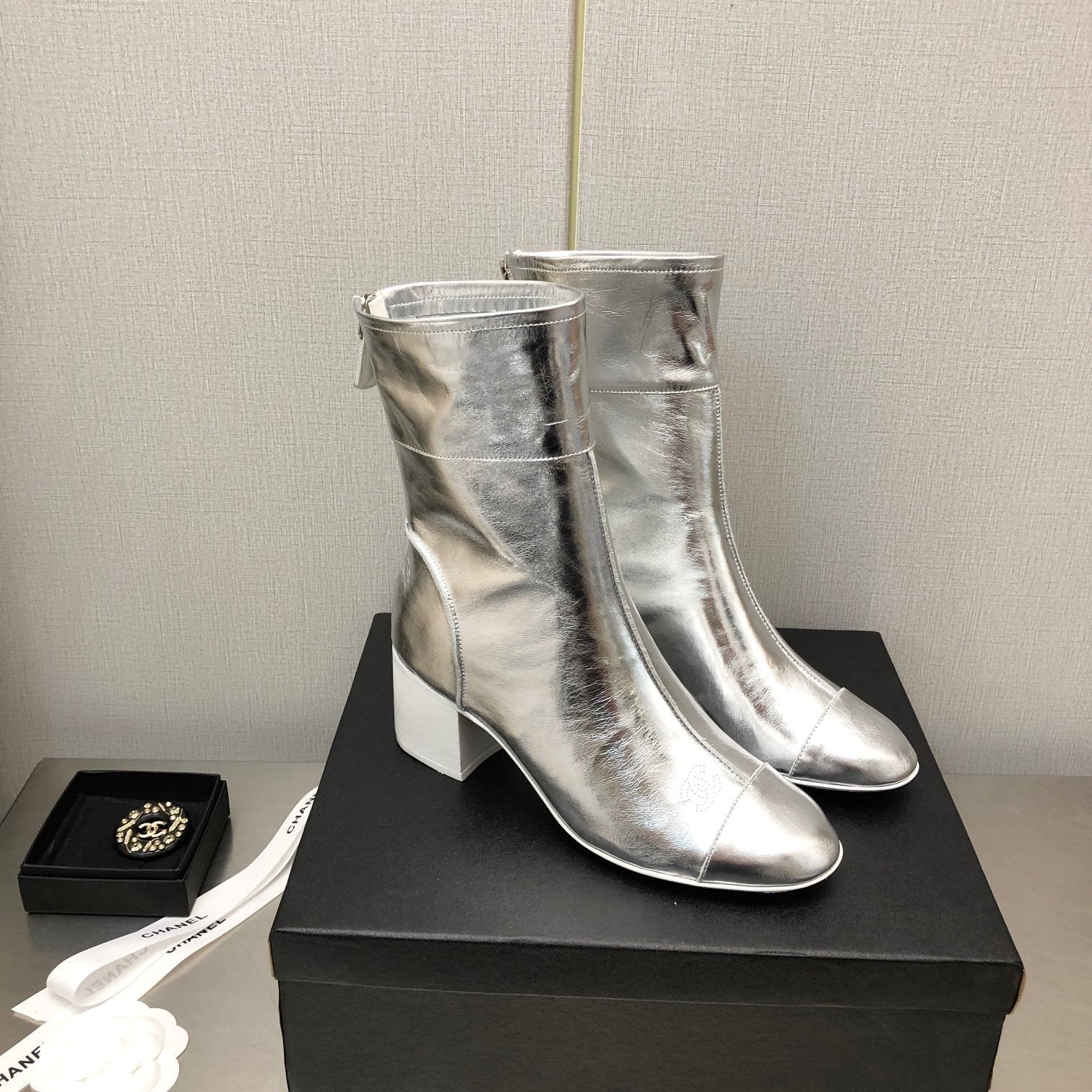 CHANEL BLOCK HEEL ANKLE BOOTS IN SILVER CALFSKIN