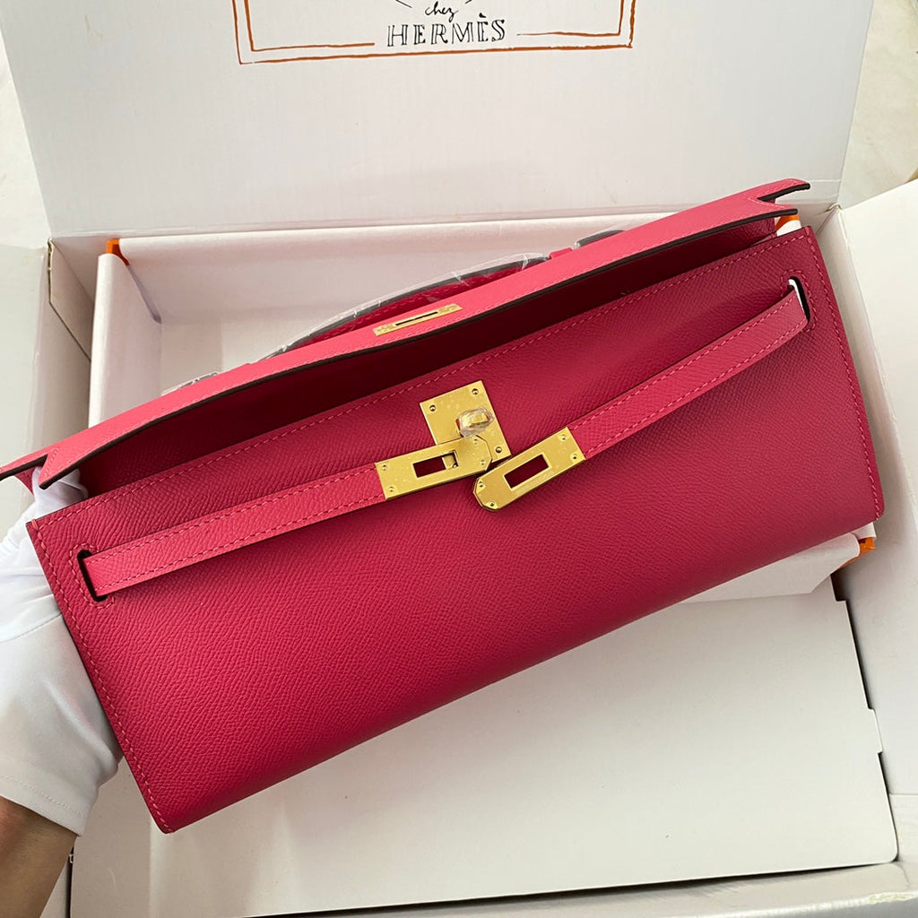HERMES KELLY CUT 31 IN CHERRY RED CALFSKIN WITH GOLD HARDWARE