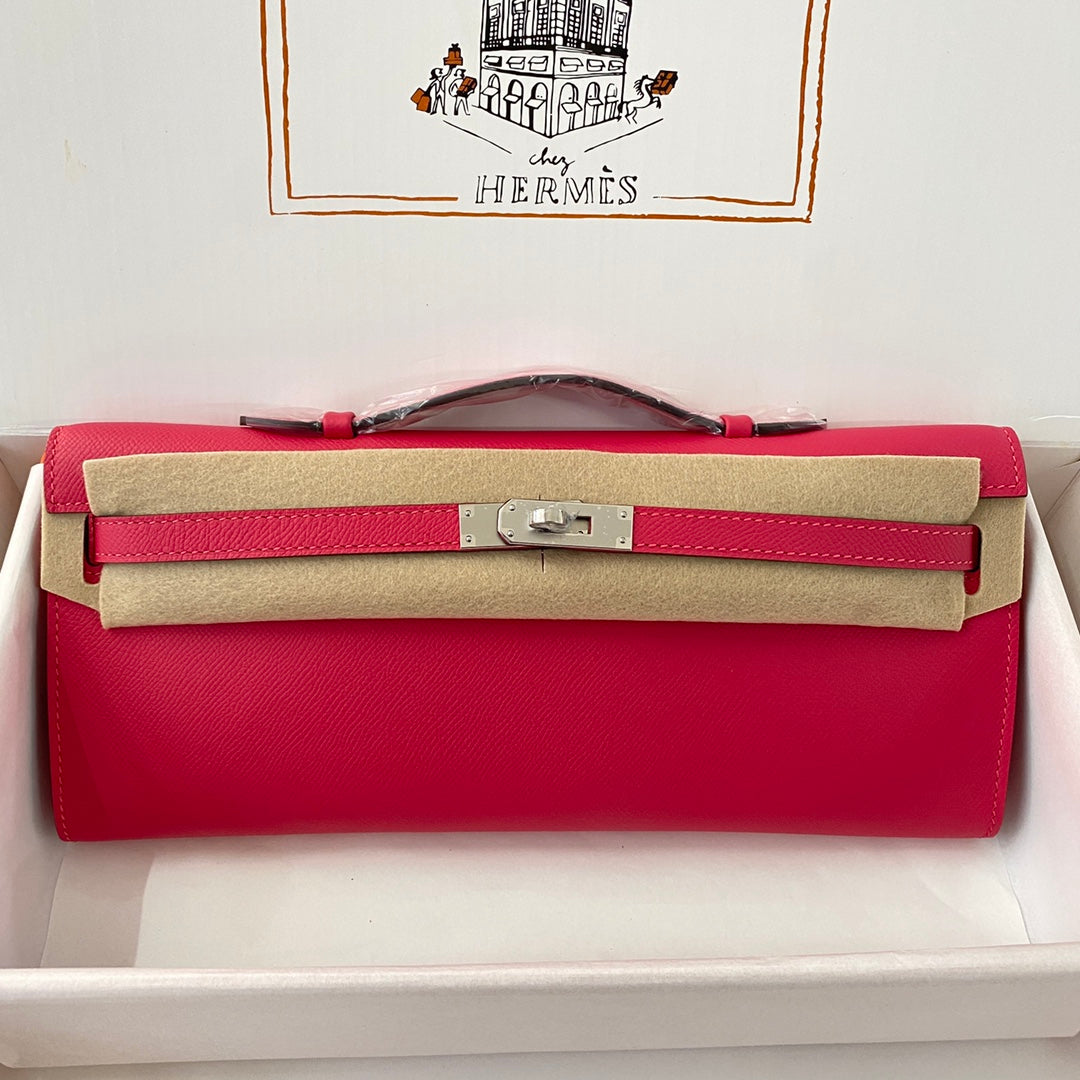 HERMES KELLY CUT 31 IN CHERRY RED CALFSKIN WITH SILVER HARDWARE