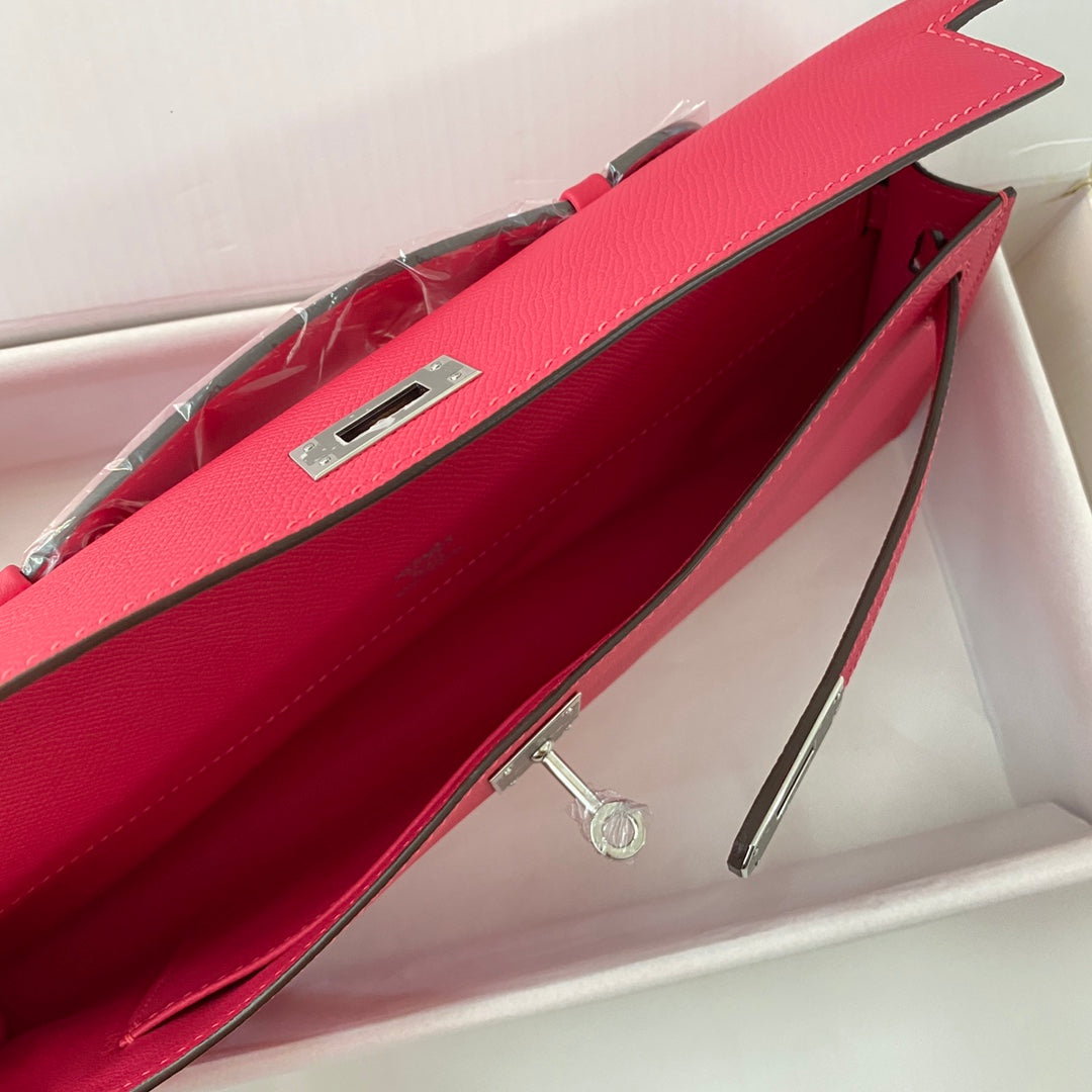 HERMES KELLY CUT 31 IN CHERRY RED CALFSKIN WITH SILVER HARDWARE