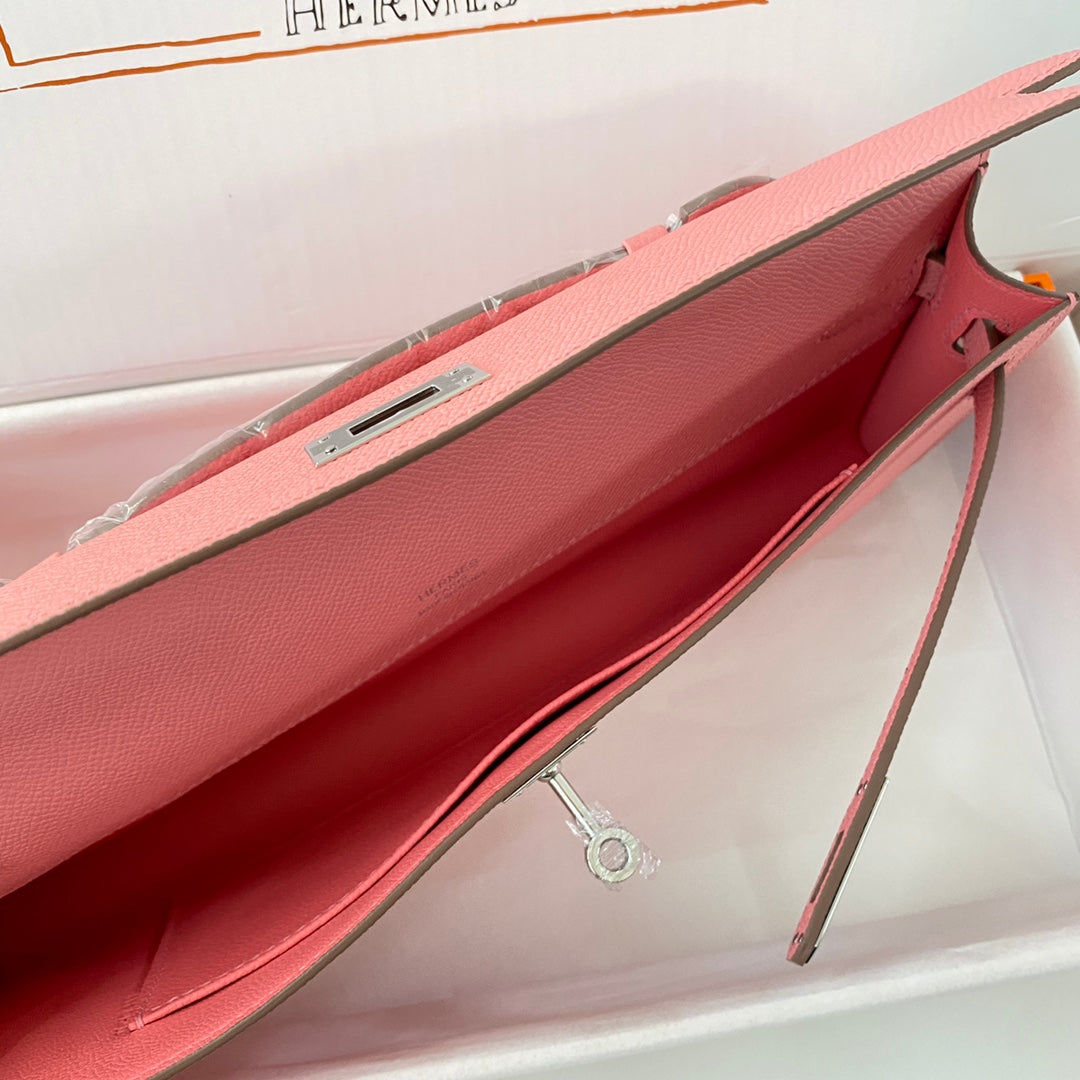 HERMES KELLY CUT 31 IN SALMON PINK CALFSKIN WITH SILVER HARDWARE