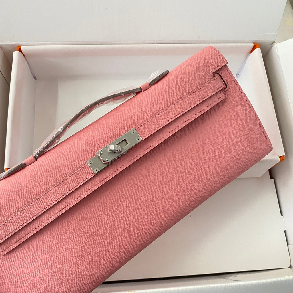 HERMES KELLY CUT 31 IN SALMON PINK CALFSKIN WITH SILVER HARDWARE