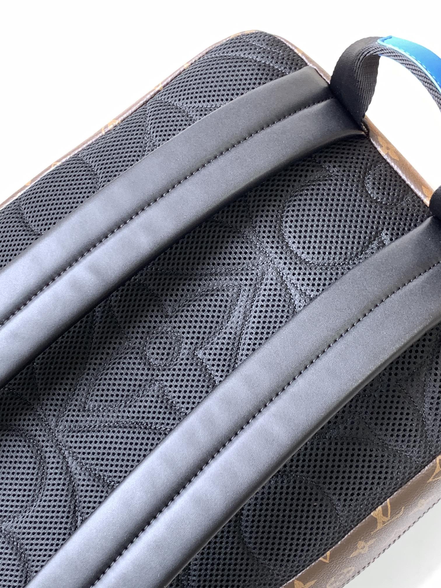 LOUIS VUITTON DEAN BACKPACK 42 IN BLUE AND BROWN MONOGRAM CANVAS