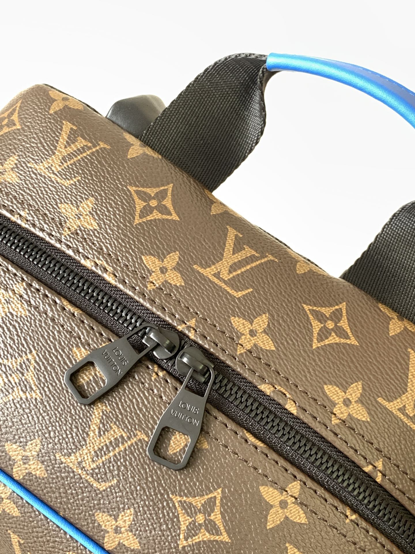 LOUIS VUITTON DEAN BACKPACK 42 IN BLUE AND BROWN MONOGRAM CANVAS