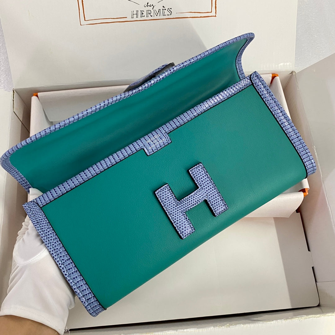 HERMES JIGE ELAN 29 CLUTCH IN TEAL GREEN CALFSKIN WITH ROYAL BLUE LIZARD SKIN