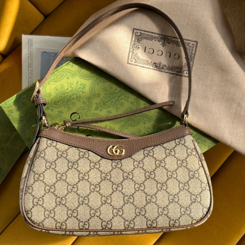GUCCI OPHIDIA  SMALL 25 HANDBAG BEIGE AND EBONY SUPREME CANVAS