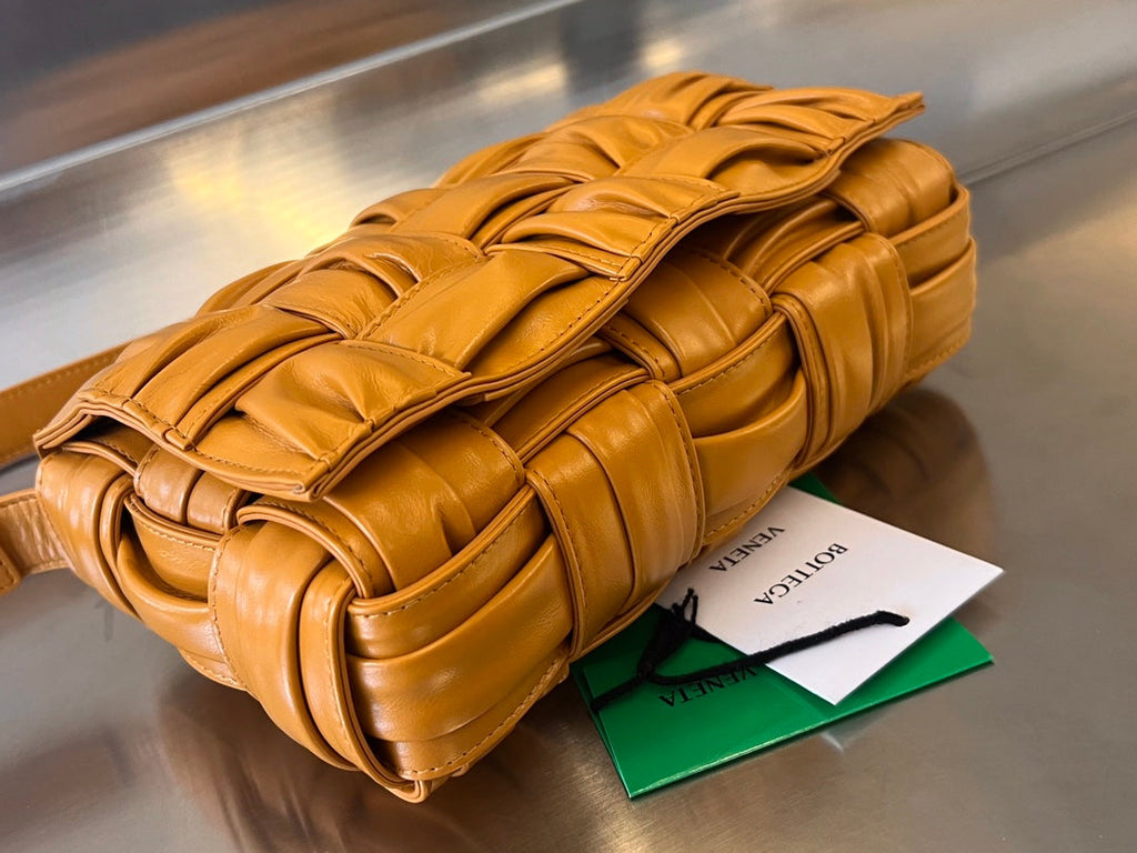 BOTTEGA VENETA CASSETTE 28 IN SANDSTONE ORANGE SOFT LAMBSKIN