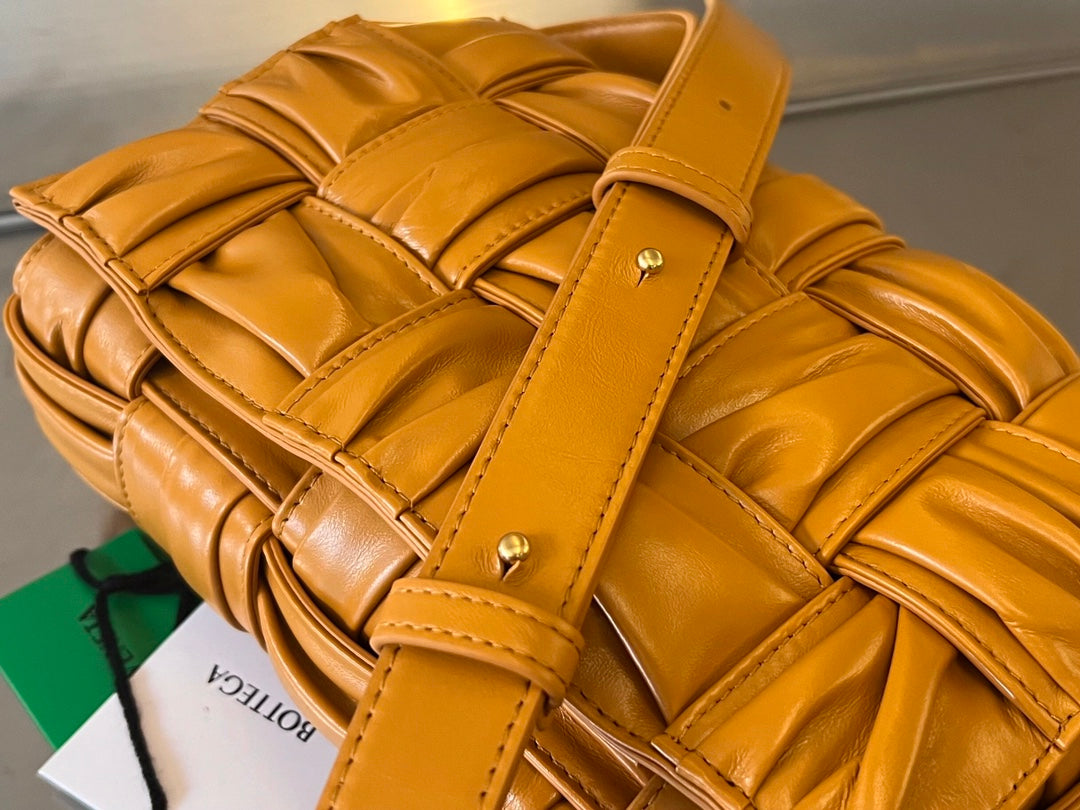 BOTTEGA VENETA CASSETTE 28 IN SANDSTONE ORANGE SOFT LAMBSKIN