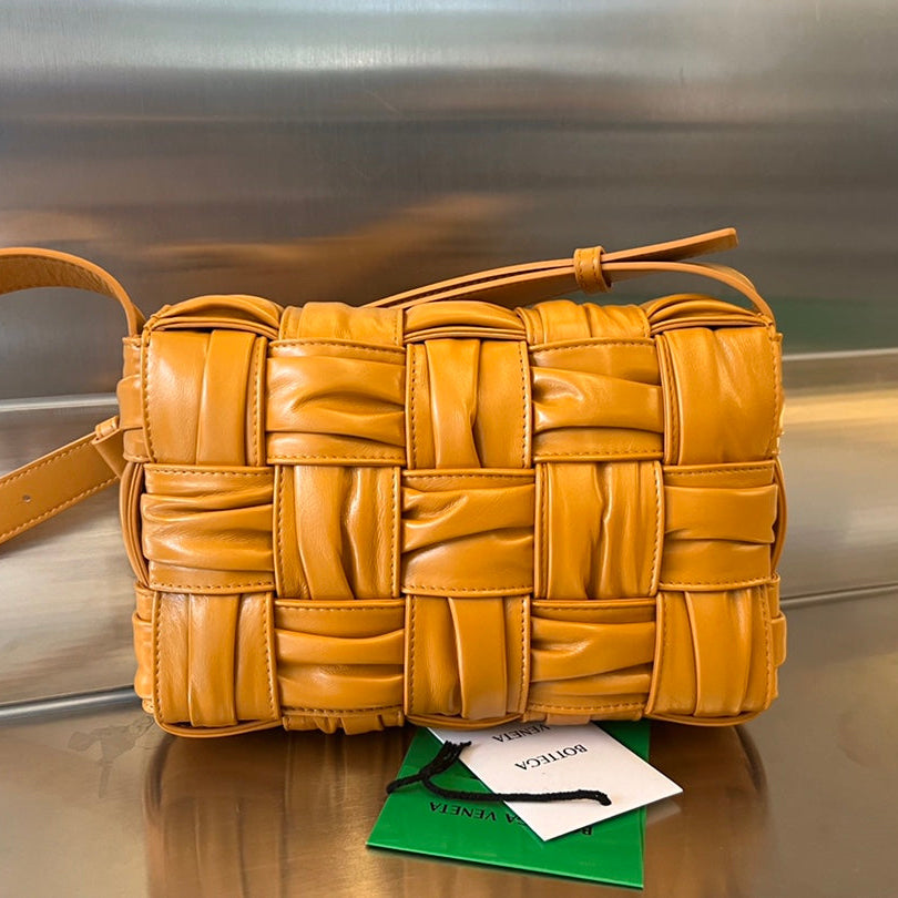BOTTEGA VENETA CASSETTE 28 IN SANDSTONE ORANGE SOFT LAMBSKIN