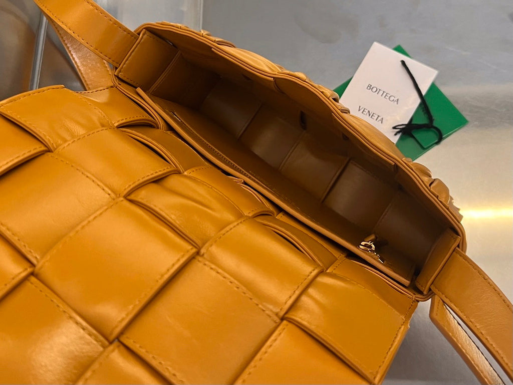 BOTTEGA VENETA CASSETTE 28 IN SANDSTONE ORANGE SOFT LAMBSKIN
