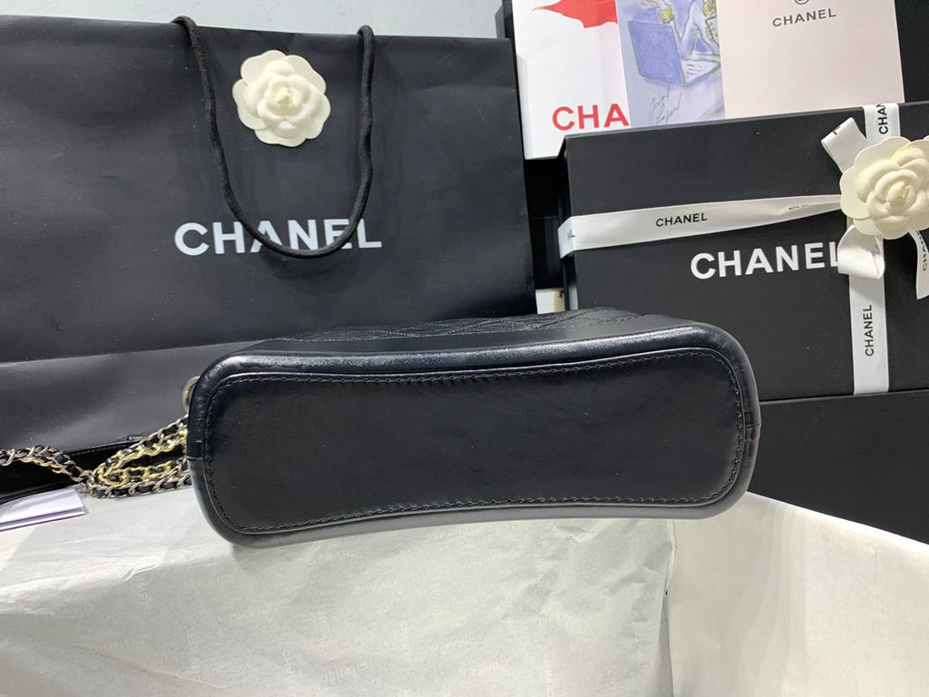 CHANEL HOBO BAG 25 WITH STRAP IN BLACK CALFSKIN GOLD AND SILVER HARDWARE