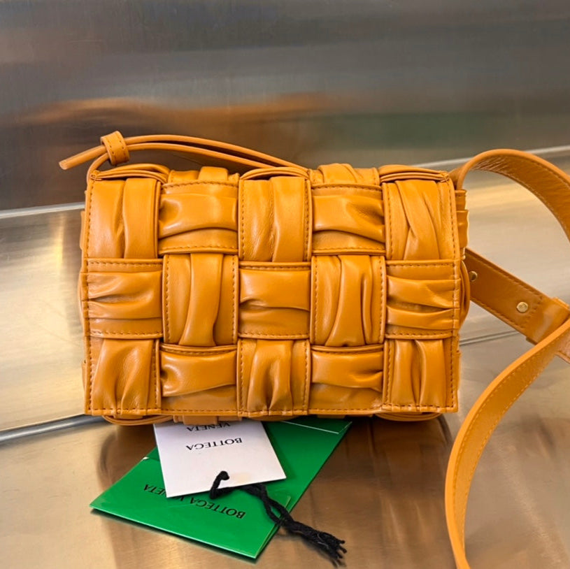 BOTTEGA VENETA MINI CASSETTE 19 IN SANDSTONE ORANGE SOFT LAMBSKIN