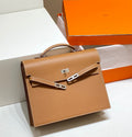 HERMES KELLY DEPECHES 34 BRIEFCASE IN GOLD TOGO CALFSKIN SILVER HARDWARE