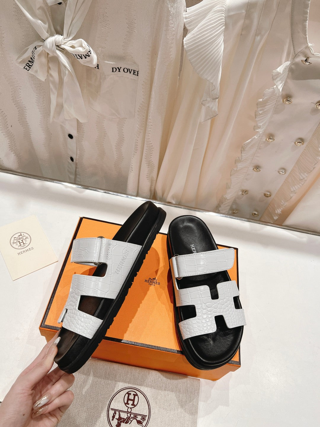 HERMES CHYPRE SANDAL BLACK AND WHITE LAMBSKIN