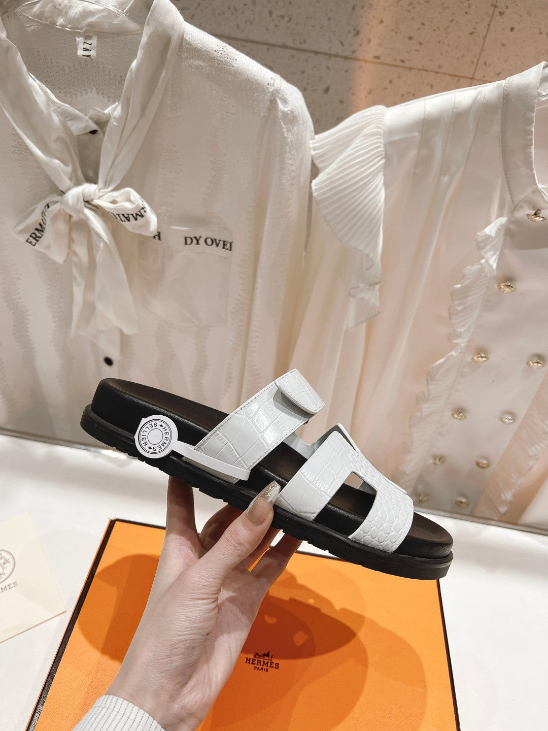 HERMES CHYPRE SANDAL BLACK AND WHITE LAMBSKIN