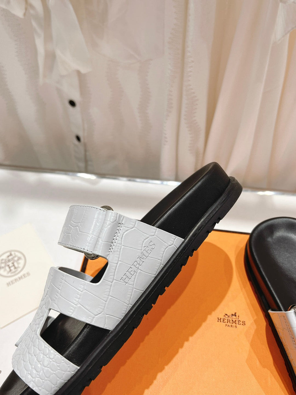 HERMES CHYPRE SANDAL BLACK AND WHITE LAMBSKIN