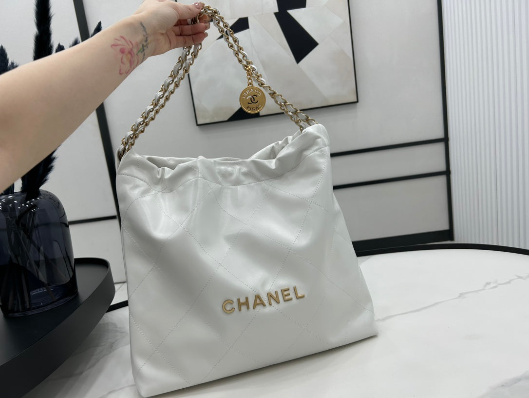 CHANEL LARGE 42 HANDBAG IN WHITE CALFSKIN GOLD HARDWARE