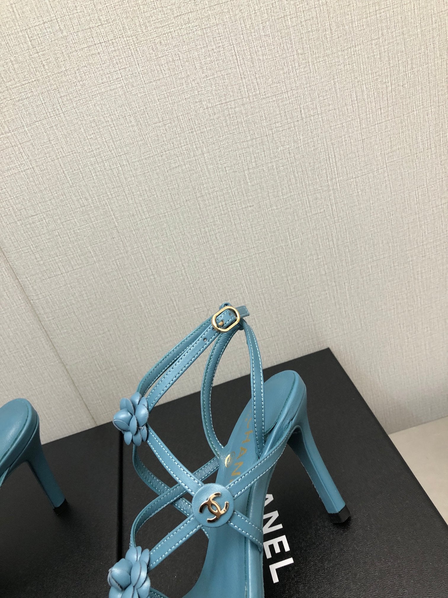 CHANEL FLORAL HIGH HEEL SANDAL IN SAPPHIRE BLUE LAMBSKIN