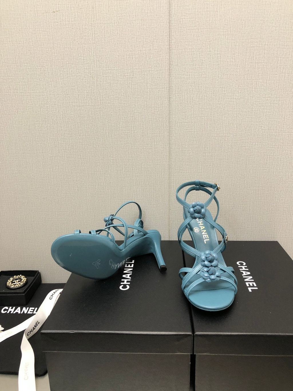 CHANEL FLORAL HIGH HEEL SANDAL IN SAPPHIRE BLUE LAMBSKIN