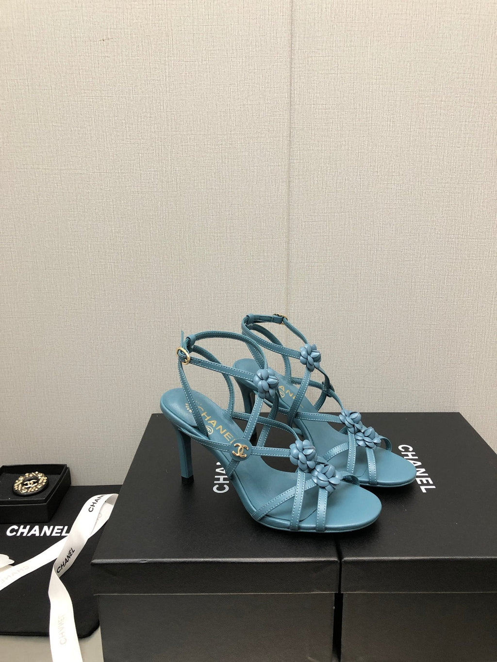 CHANEL FLORAL HIGH HEEL SANDAL IN SAPPHIRE BLUE LAMBSKIN