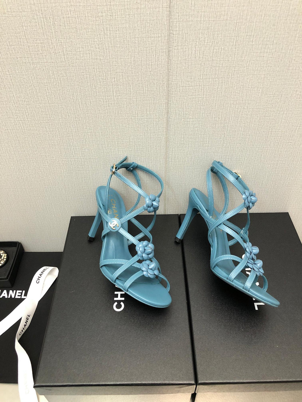 CHANEL FLORAL HIGH HEEL SANDAL IN SAPPHIRE BLUE LAMBSKIN