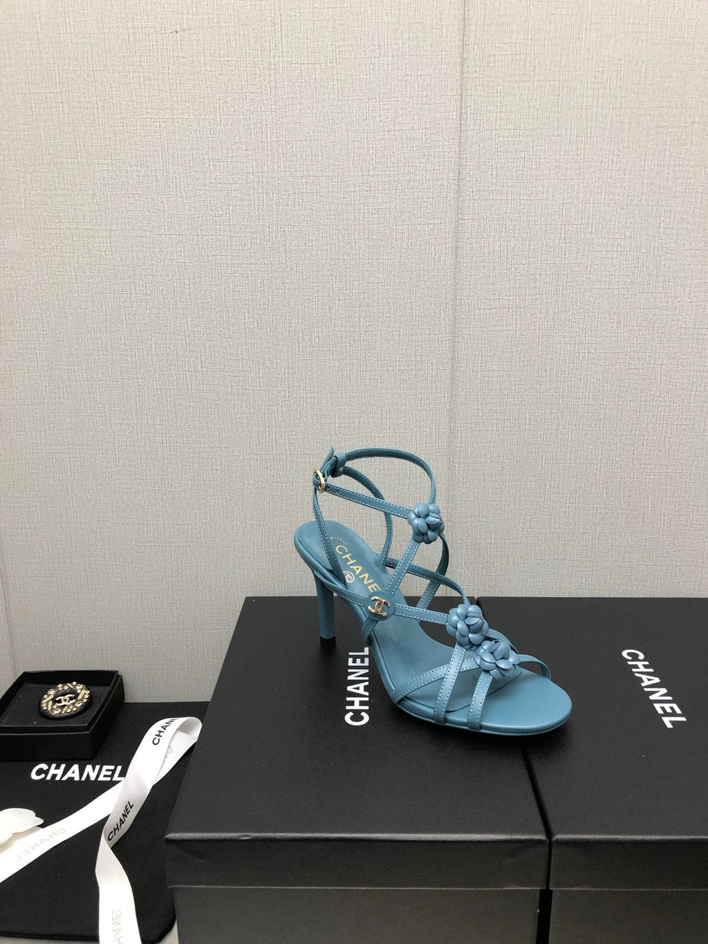 CHANEL FLORAL HIGH HEEL SANDAL IN SAPPHIRE BLUE LAMBSKIN