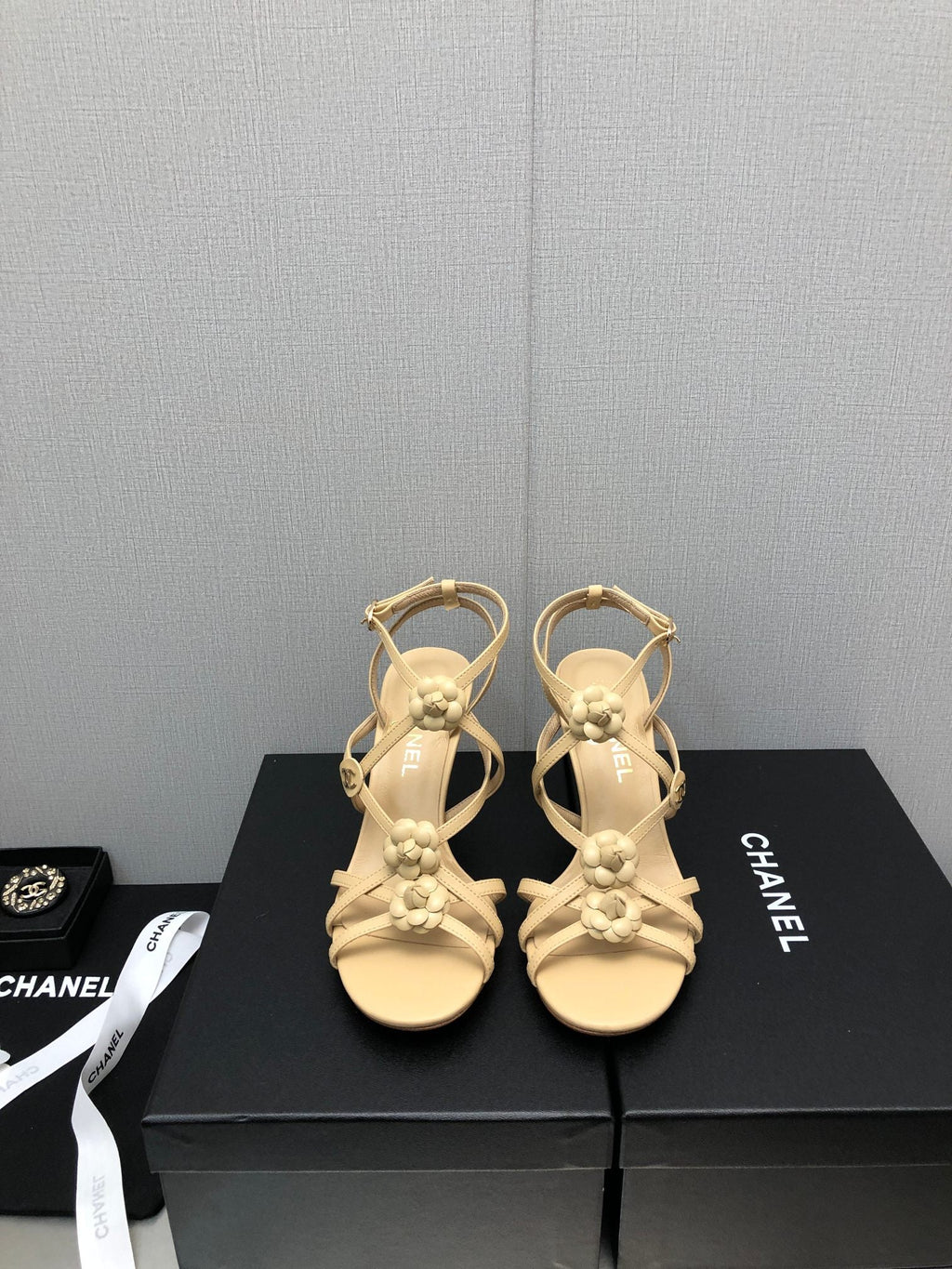 CHANEL FLORAL HIGH HEEL SANDAL IN SAND YELLOW LAMBSKIN