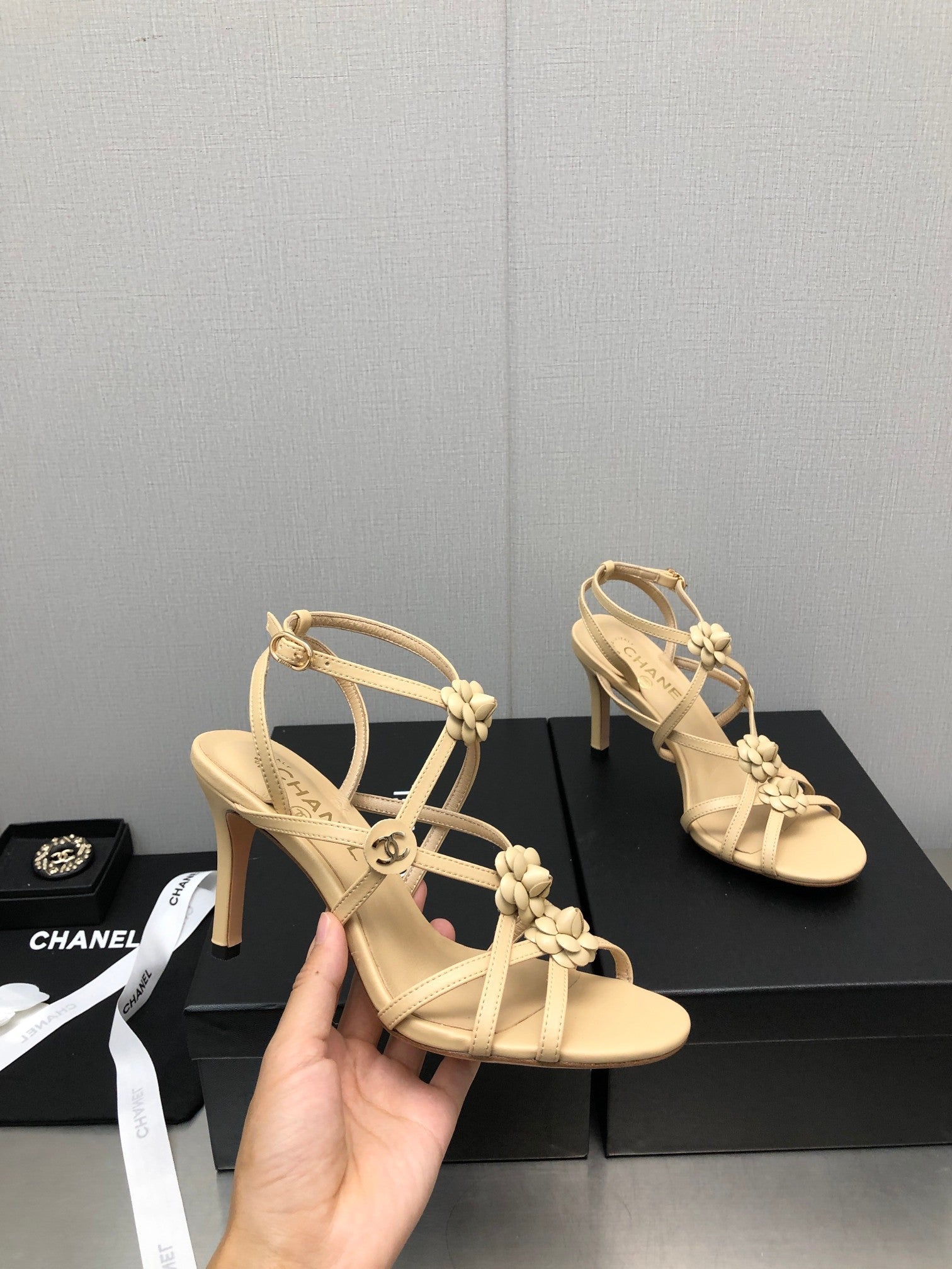 CHANEL FLORAL HIGH HEEL SANDAL IN SAND YELLOW LAMBSKIN
