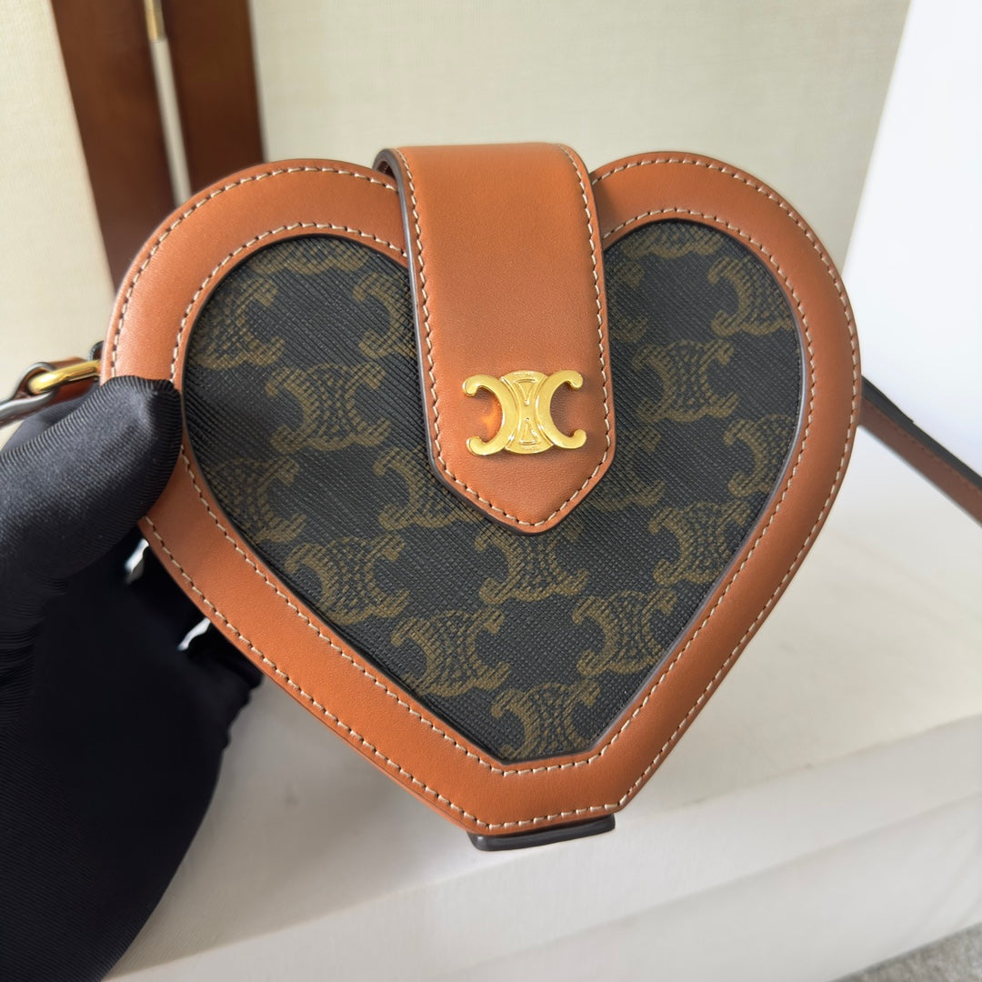 CELINE HEART TAMBOUR BAG 15 IN BLACK TRIOMPHE CANVAS AND BRONZE BROWN CALFSKIN