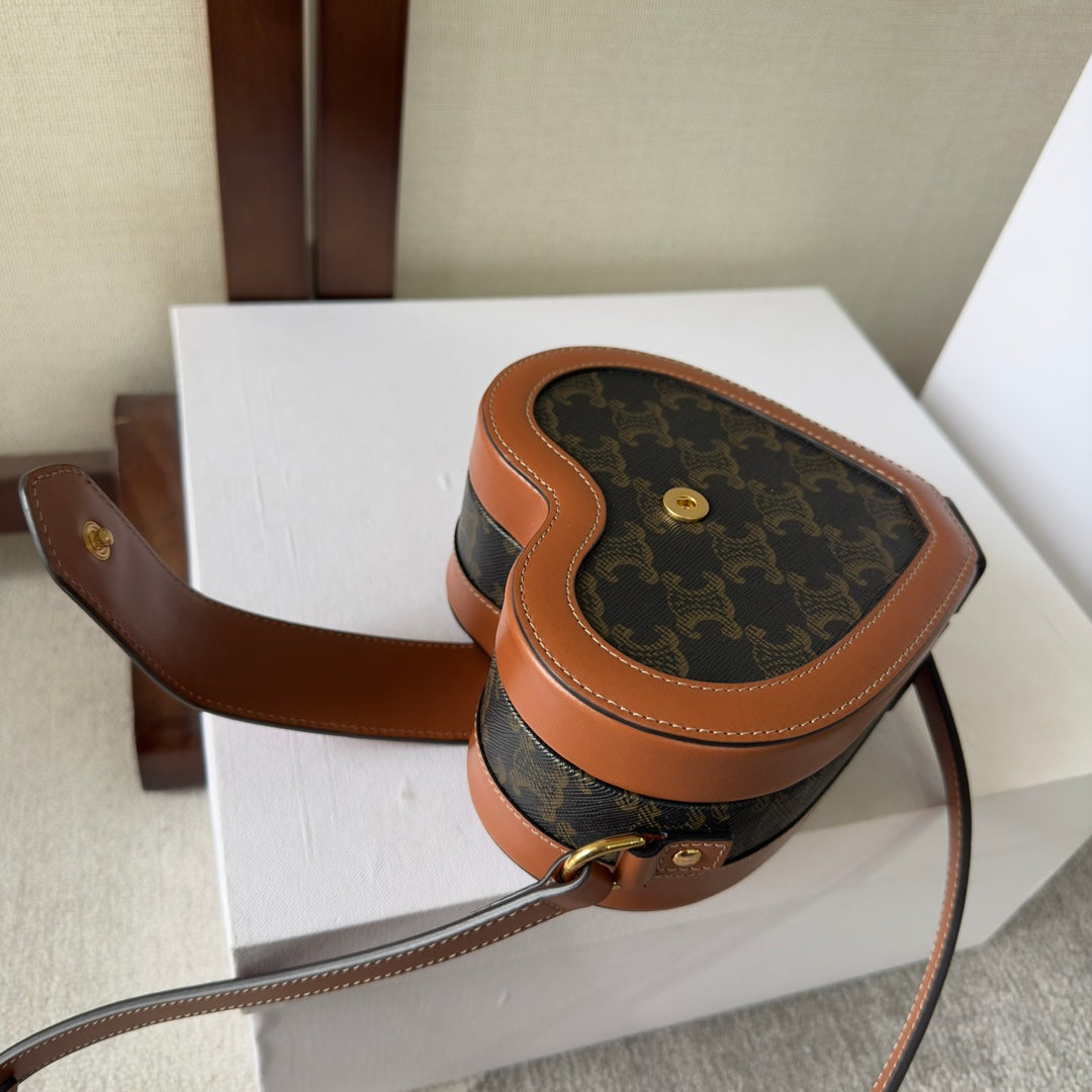 CELINE HEART TAMBOUR BAG 15 IN BLACK TRIOMPHE CANVAS AND BRONZE BROWN CALFSKIN