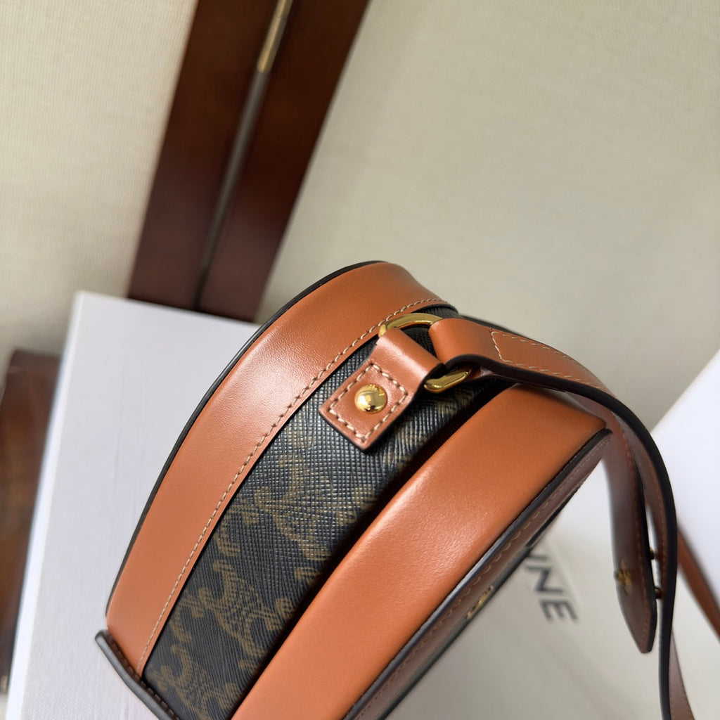CELINE HEART TAMBOUR BAG 15 IN BLACK TRIOMPHE CANVAS AND BRONZE BROWN CALFSKIN