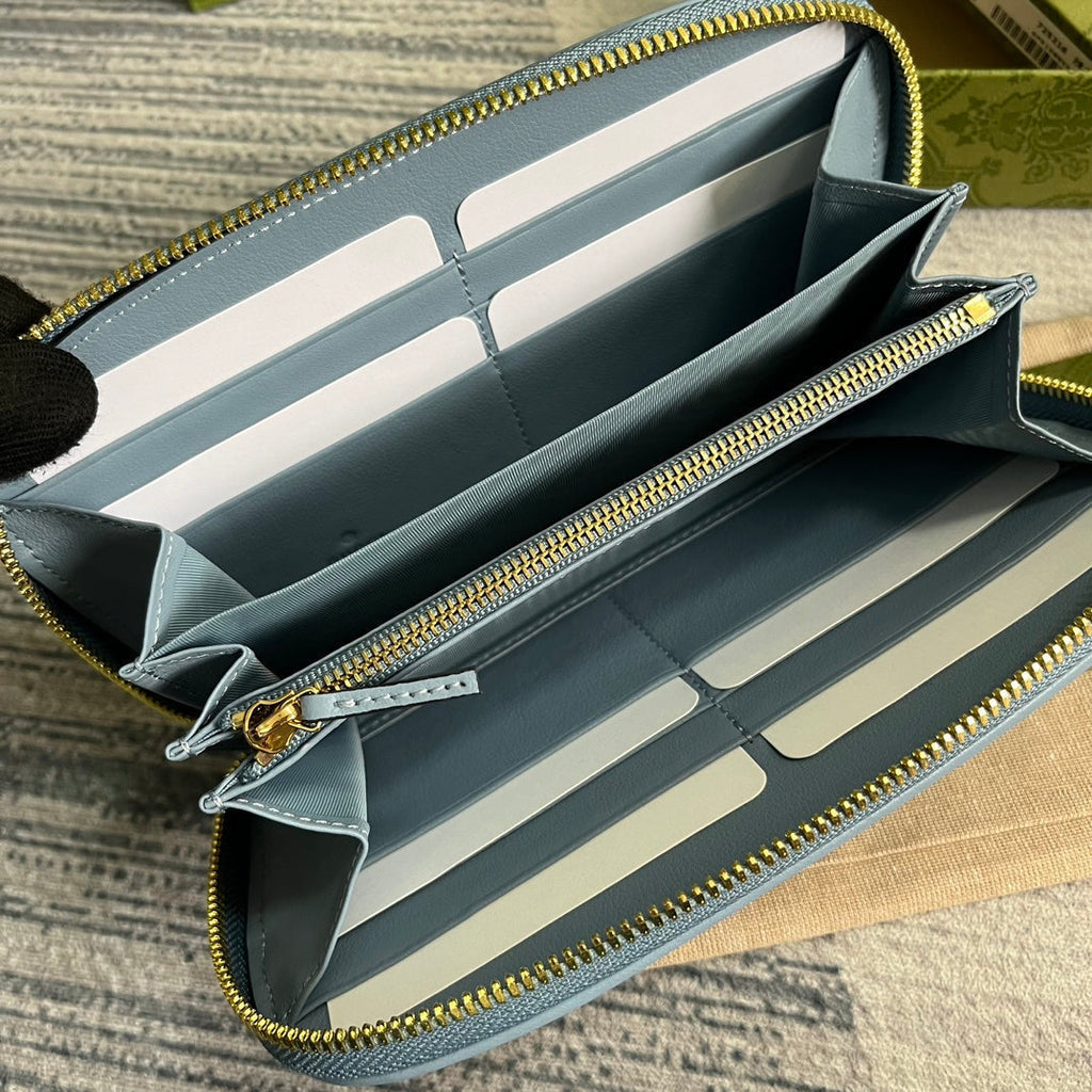 GUCCI BLONDIE 21 FULL ZIP WALLET IN BLUE PASTEL CALFSKIN