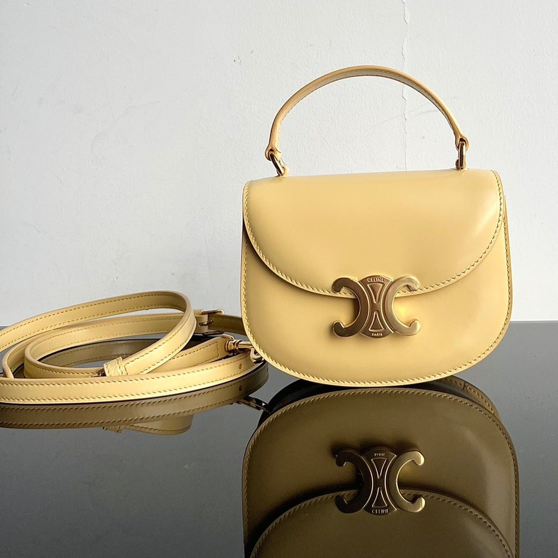 CELINE TRIOMPHE SHINY CALFSKIN HANDBAG 18 YELLOW PASTEL