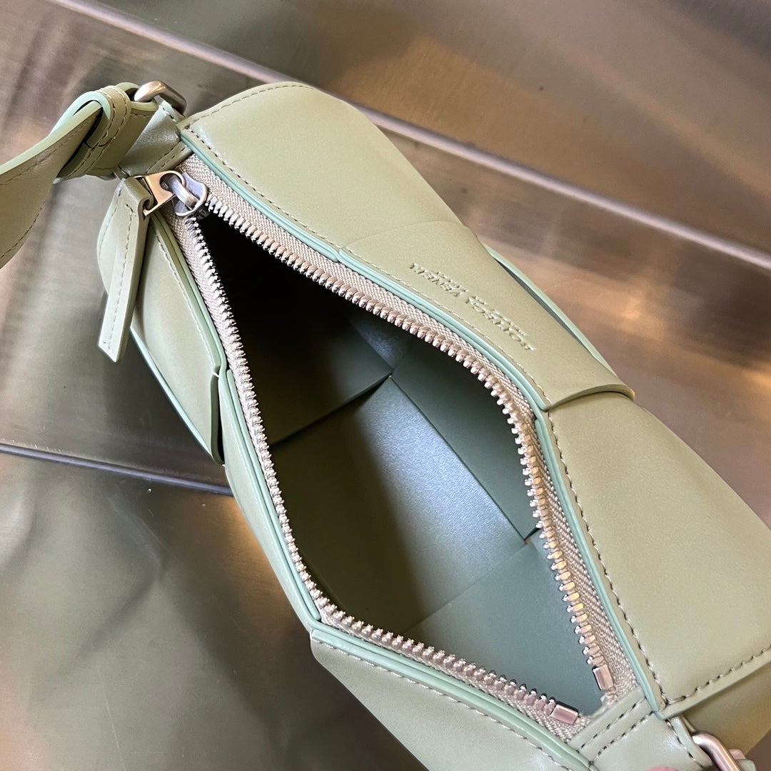 BOTTEGA VENETA SMALL CYLINDER CASSETTE 21 IN TRAVERTINE CALFSKIN