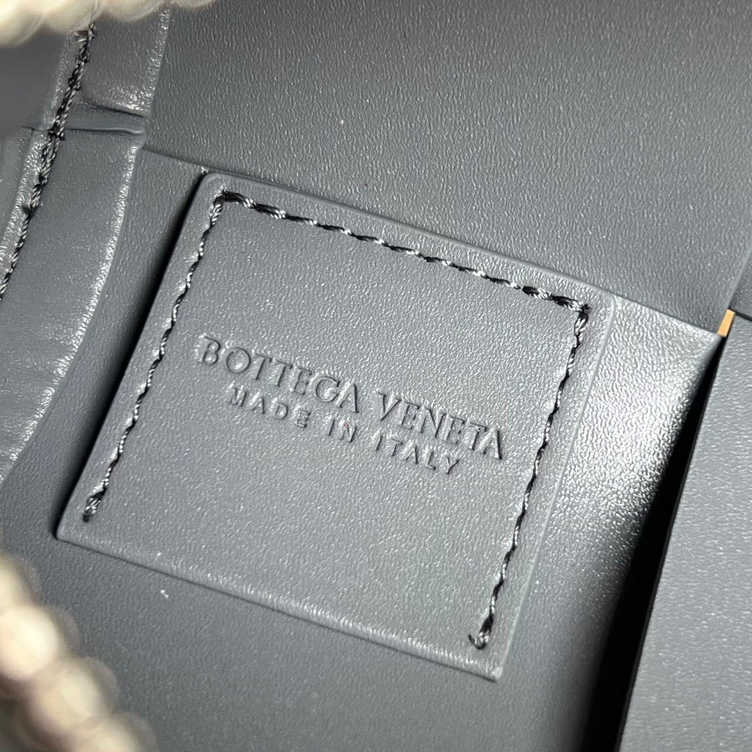BOTTEGA VENETA SMALL CYLINDER CASSETTE 21 IN LAVA GRAY CALFSKIN