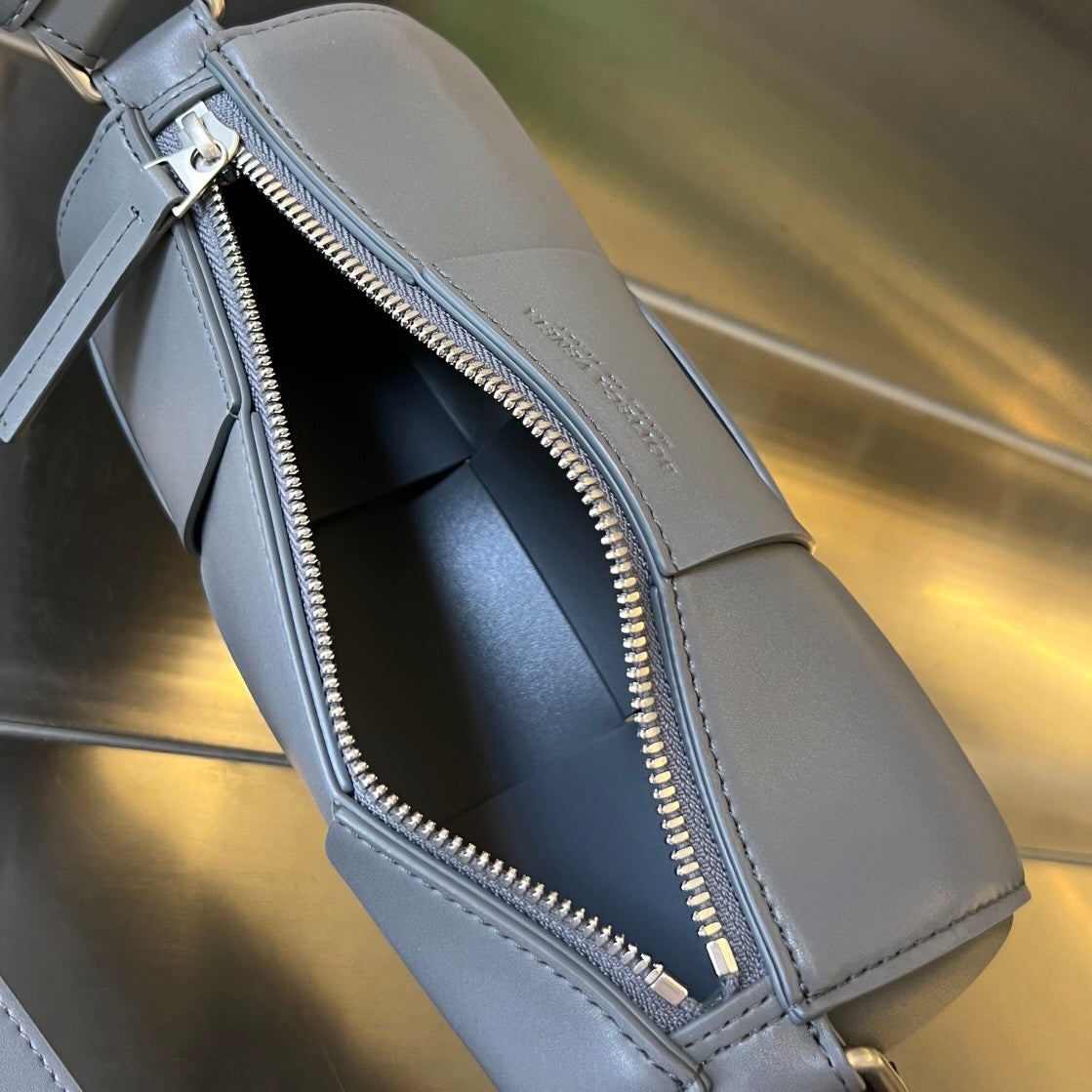 BOTTEGA VENETA SMALL CYLINDER CASSETTE 21 IN LAVA GRAY CALFSKIN