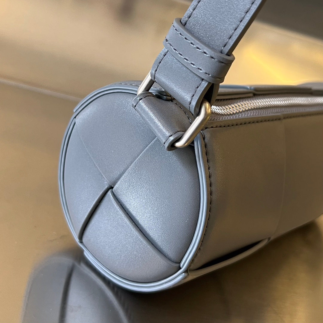 BOTTEGA VENETA SMALL CYLINDER CASSETTE 21 IN LAVA GRAY CALFSKIN