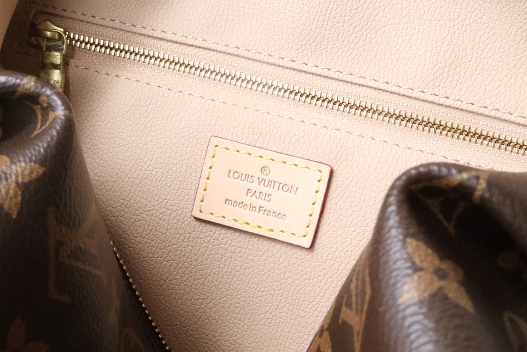 LOUIS VUITTON COSMETIC BAG 27 IN BROWN MONOGRAM COATED CANVAS