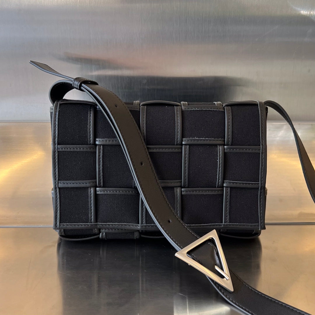 BOTTEGA VENETA SMALL CASSETTE 23 IN BLACK CANVAS AND CALFSKIN TRIM