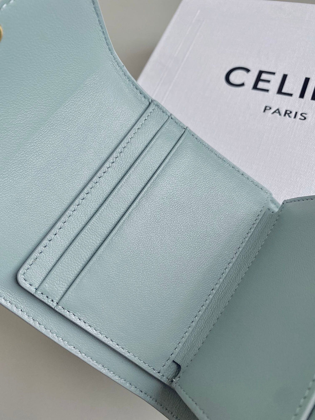 CELINE TRIPHOME 10 TRIFOLD WALLET CALFSKIN BLUE PASTEL