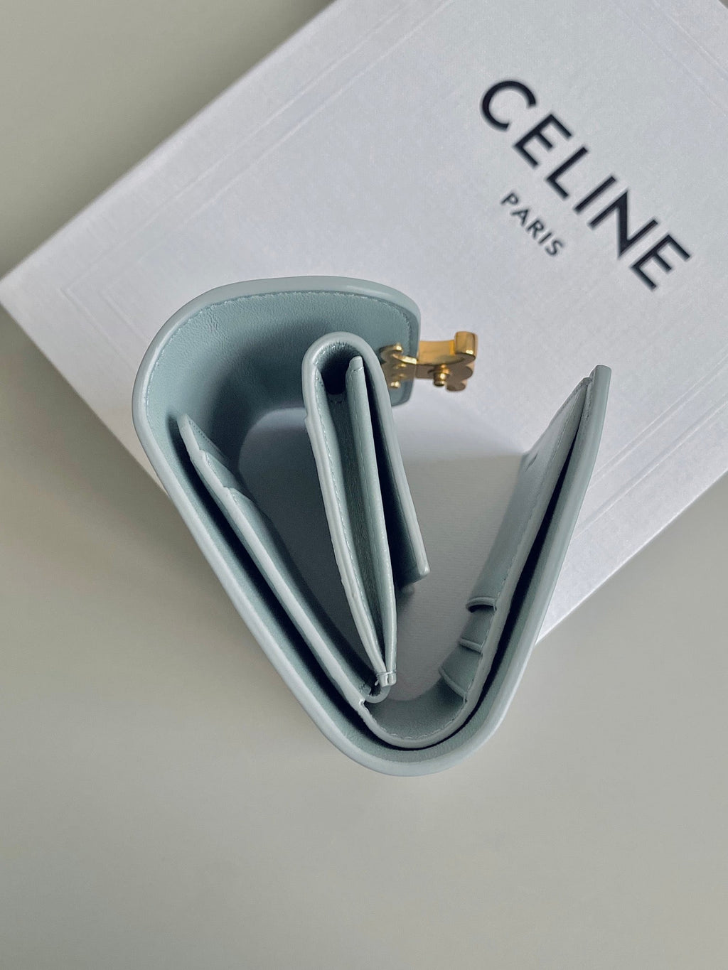 CELINE TRIPHOME 10 TRIFOLD WALLET CALFSKIN BLUE PASTEL